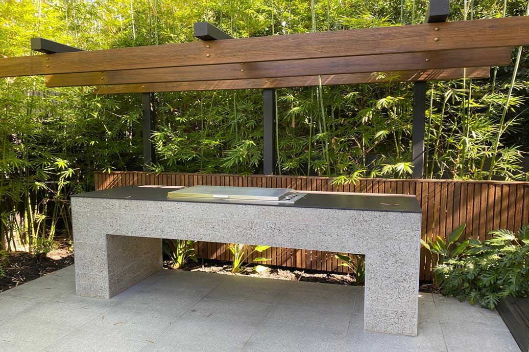 Modern outdoor kitchen with bamboo and stone design